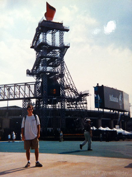 In front of the Olympic Torch at Atlanta