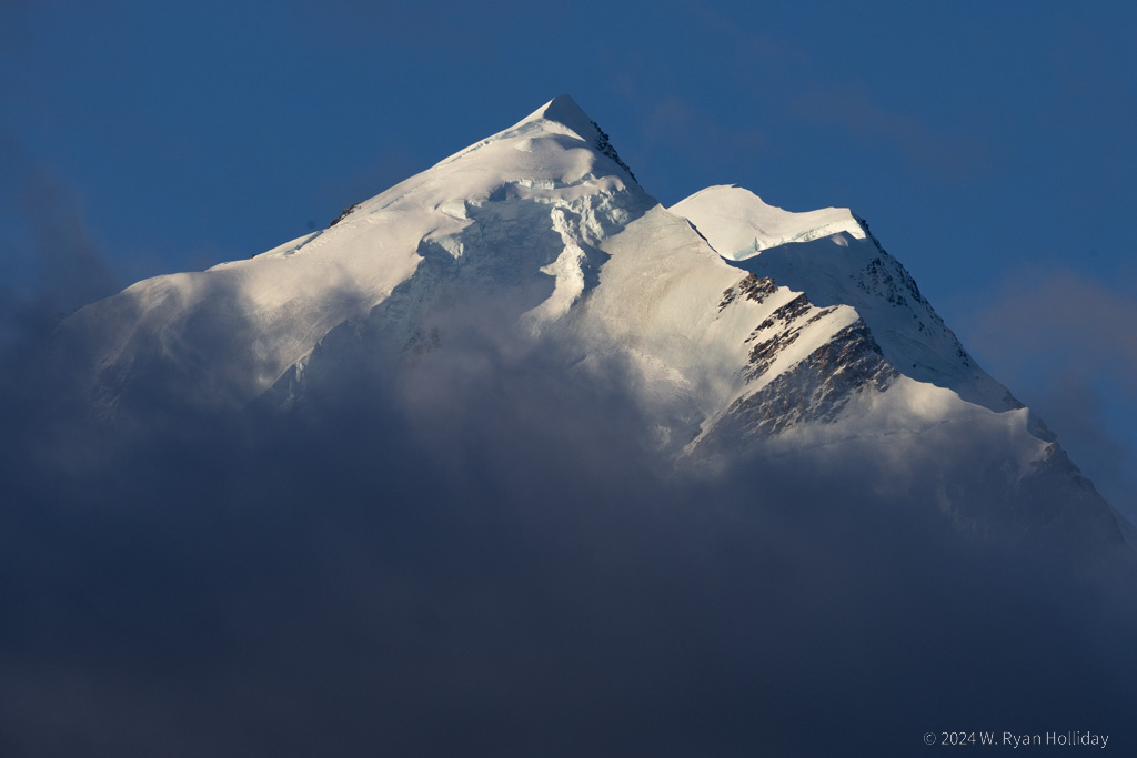 Aoraki / Mount Cook rising from the clouds